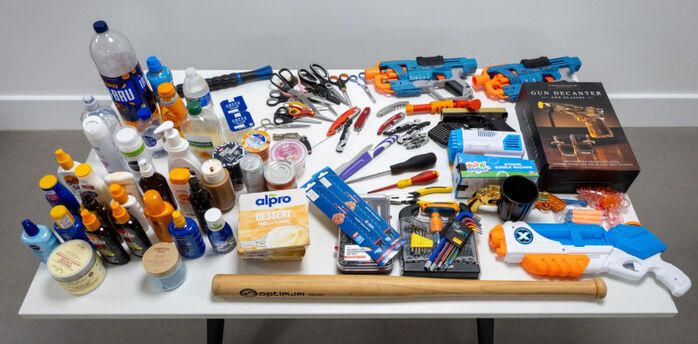 Confiscated liquids, tools and toys at Manchester Airport
