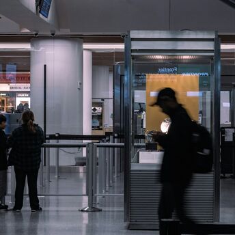 Passenger at airport security screening