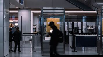 Passenger at airport security screening