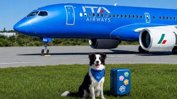 Dog beside an ITA Airways aircraft