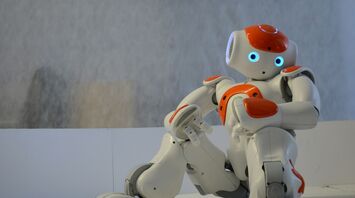 Small humanoid toy robot