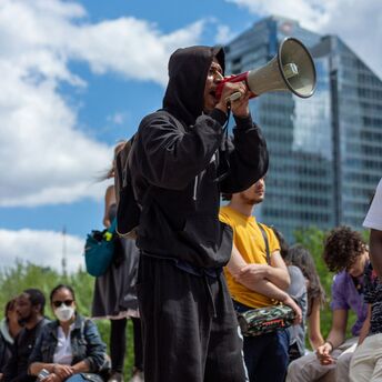 Protester speaking through a megaphone