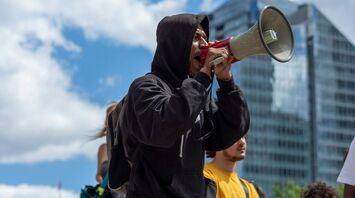 Protester speaking through a megaphone