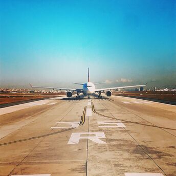 Aircraft taxiing on an airport runway
