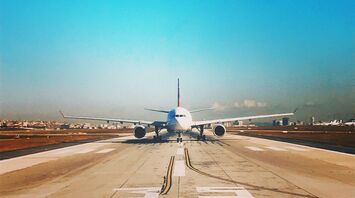 Aircraft taxiing on an airport runway
