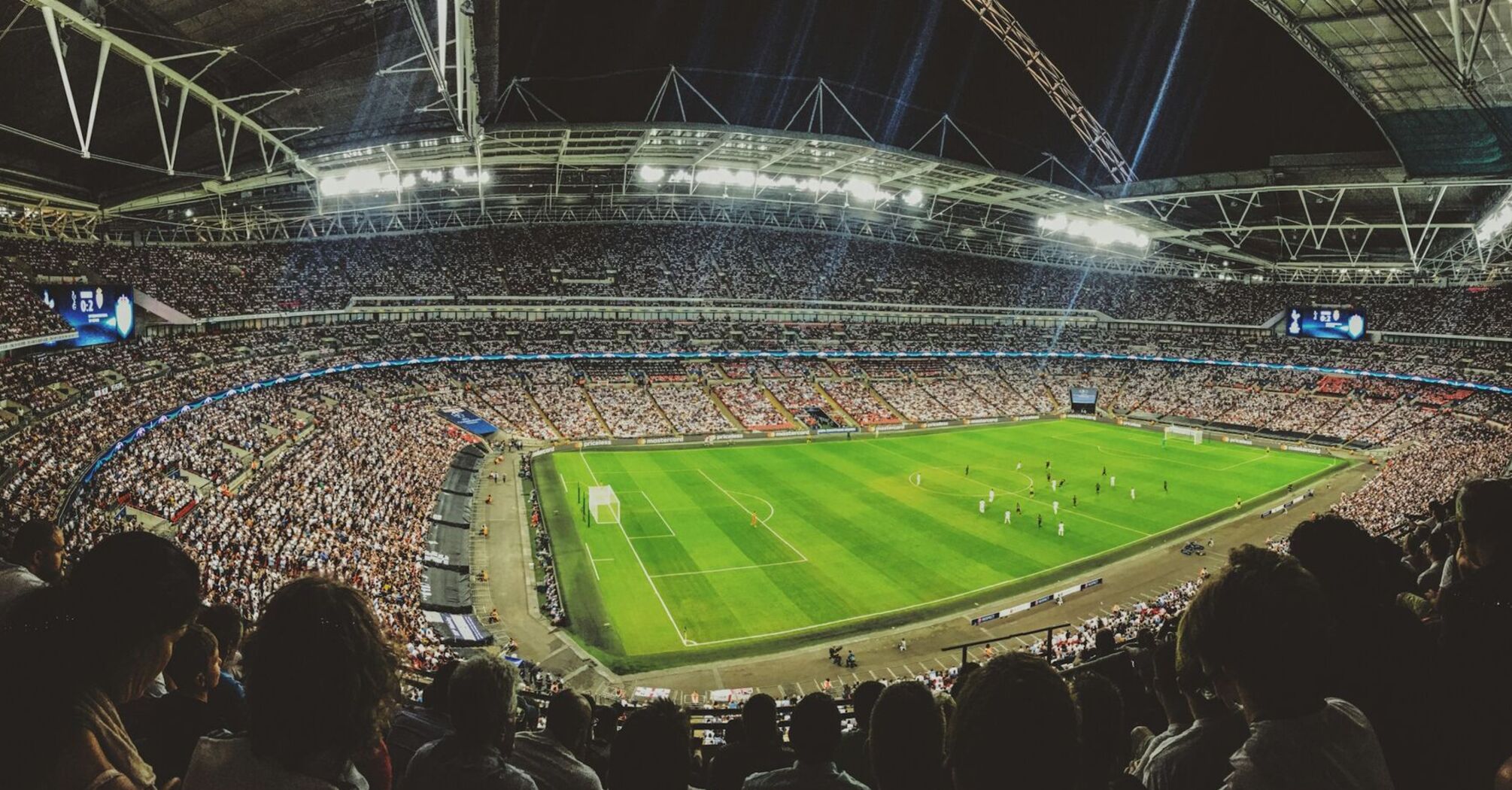 Crowded football stadium during a match
