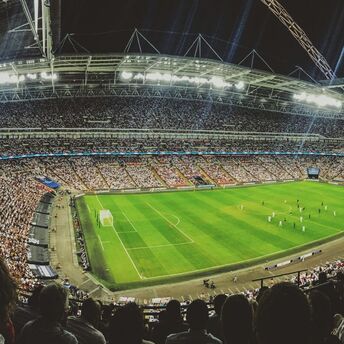 Crowded football stadium during a match