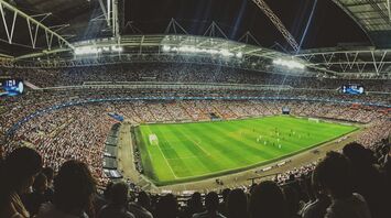 Crowded football stadium during a match