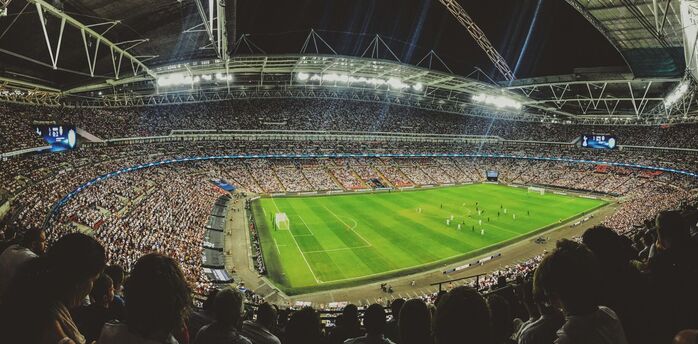 Crowded football stadium during a match