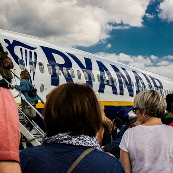 Passengers boarding a Ryanair aircraft