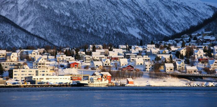 Snow-covered Tromsø waterfront in winter
