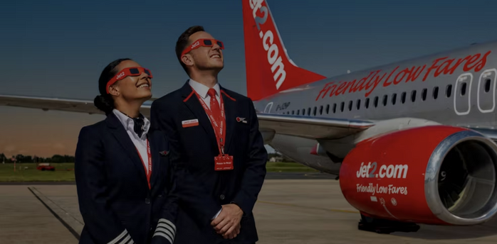 Jet2 crew wearing solar eclipse glasses