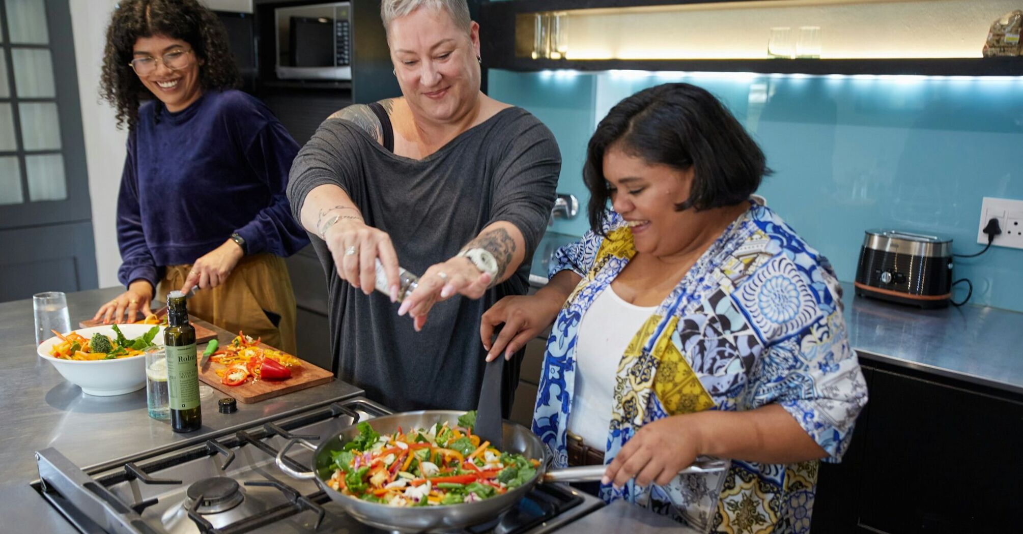 Travellers taking part in a cooking class