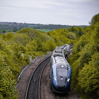 High-speed passenger train travelling through the UK