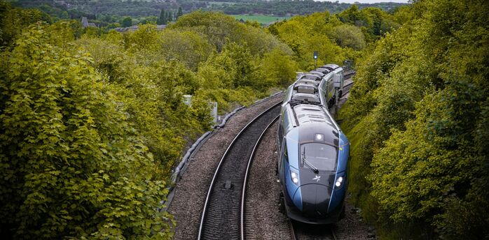 High-speed passenger train travelling through the UK