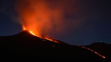 Mount Etna erupting at night in Sicily
