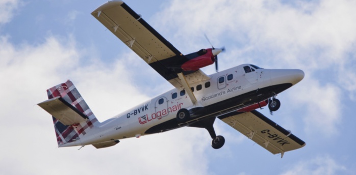 Loganair aircraft flying against a cloudy sky