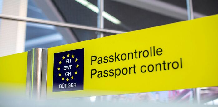 Passport control sign at a European airport