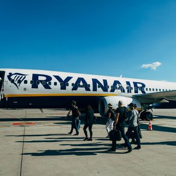 Passengers boarding a Ryanair aircraft