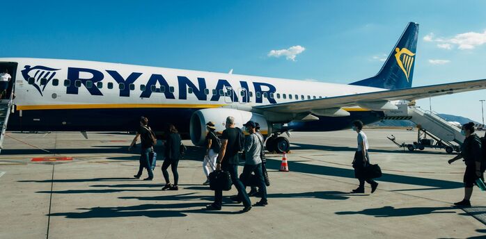 Passengers boarding a Ryanair aircraft