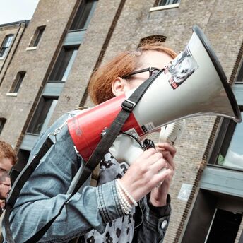 Protester speaking through a megaphone