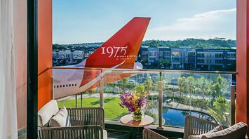 1975 Avenue & Hotel overlooking Boeing 747
