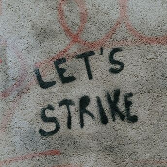Let’s strike graffiti on a concrete wall