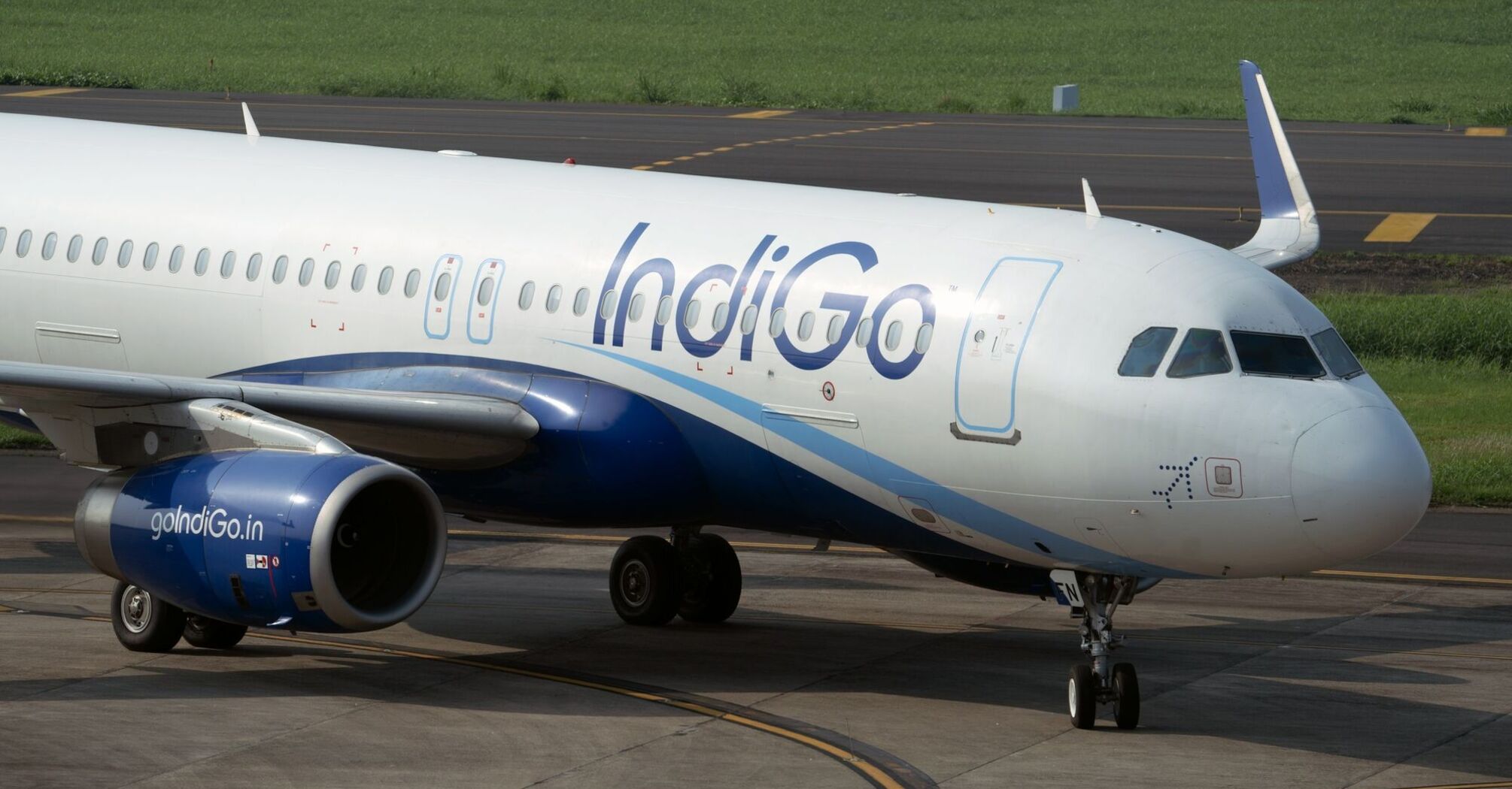 IndiGo aircraft taxiing at an airport