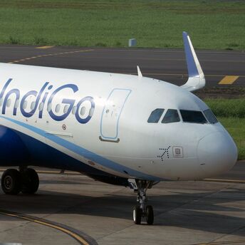 IndiGo aircraft taxiing at an airport