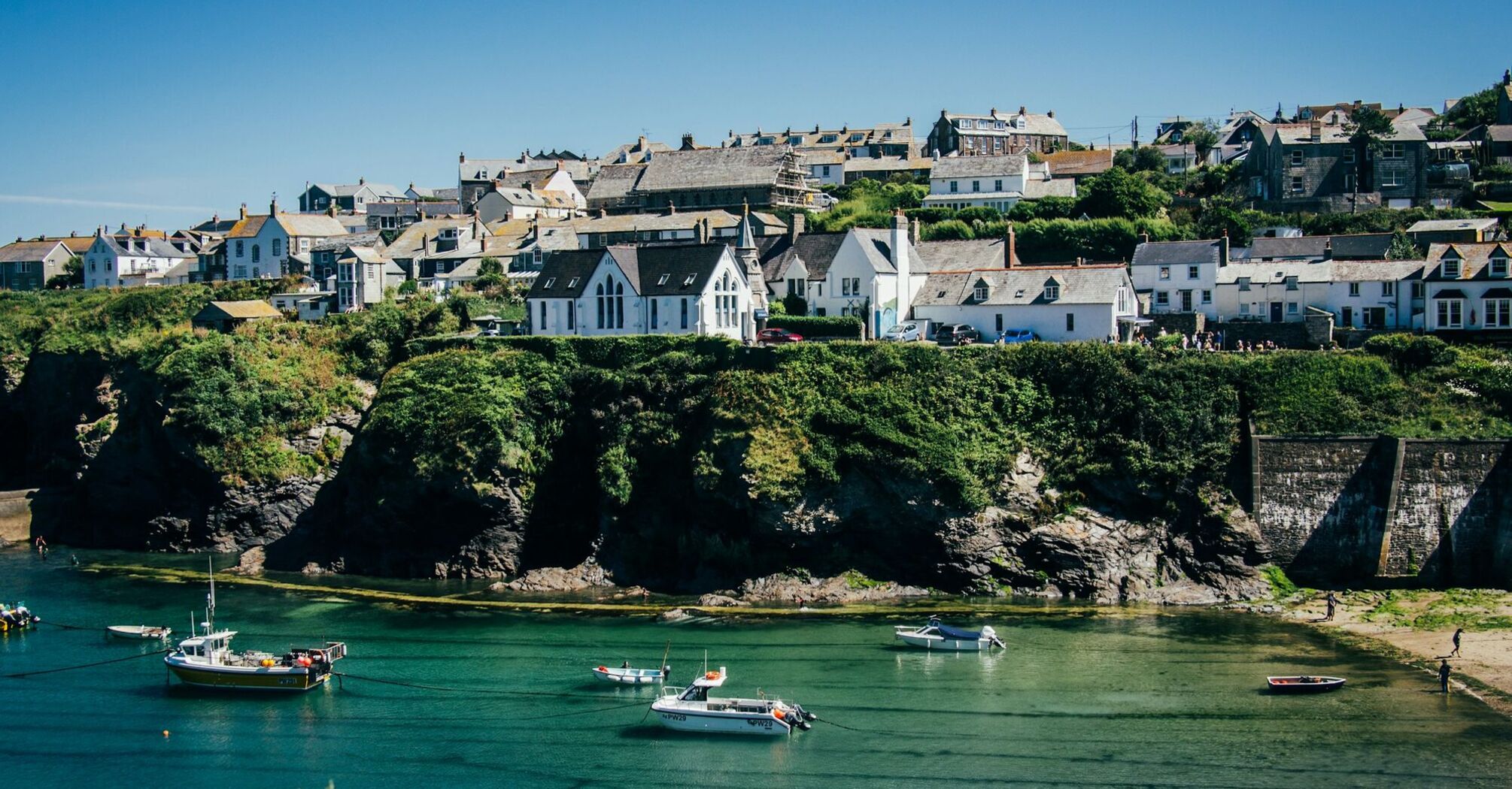 Cornish harbour village overlooking a sheltered bay