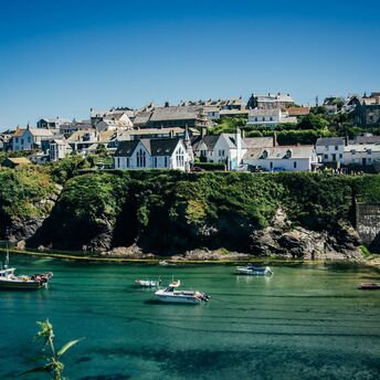 Cornish harbour village overlooking a sheltered bay