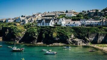Cornish harbour village overlooking a sheltered bay