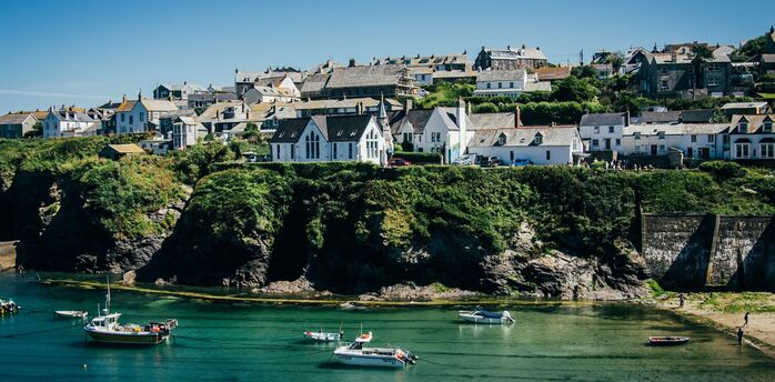 Cornish harbour village overlooking a sheltered bay