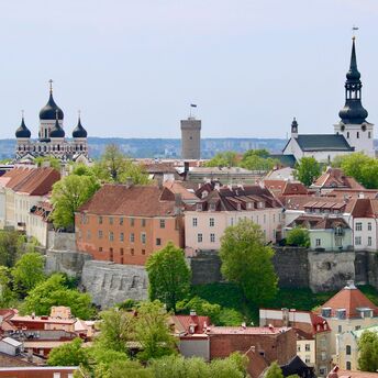 Tallinn skyline with historic churches and red-roofed buildings