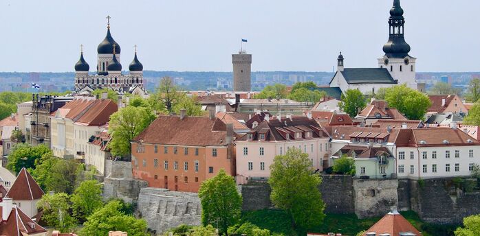 Tallinn skyline with historic churches and red-roofed buildings