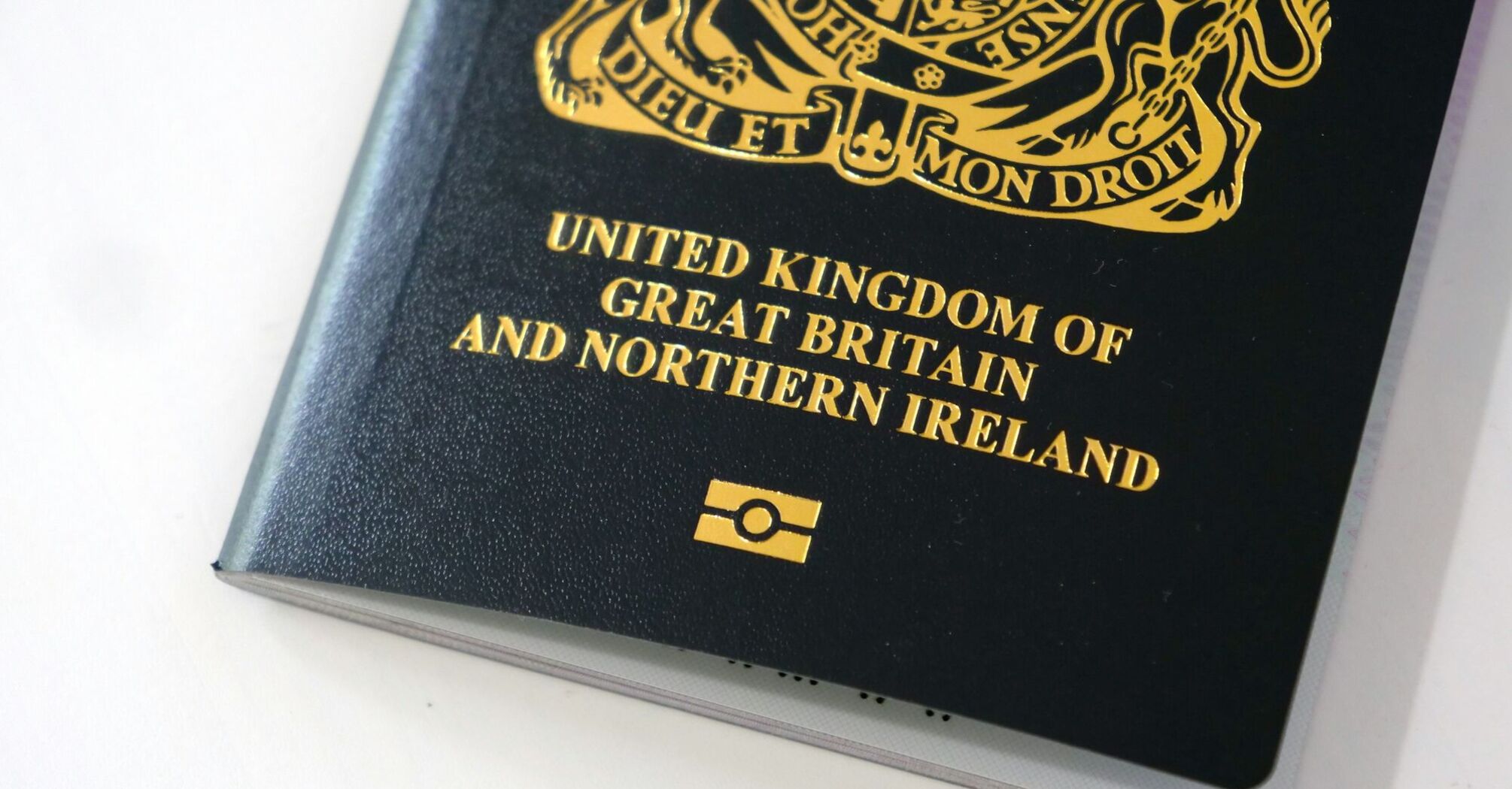British passport on a white surface