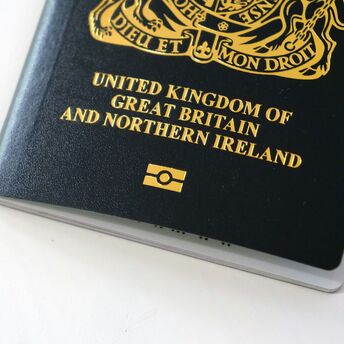 British passport on a white surface