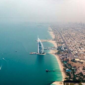 Aerial view of Burj Al Arab and Dubai coast