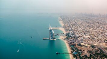 Aerial view of Burj Al Arab and Dubai coast