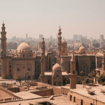Historic mosques and Cairo skyline