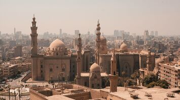 Historic mosques and Cairo skyline