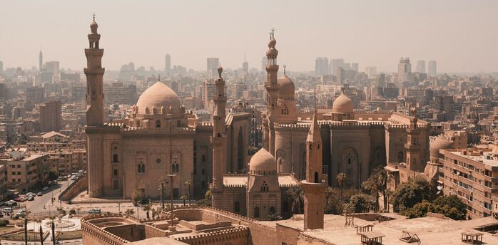 Historic mosques and Cairo skyline