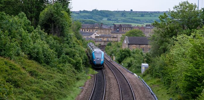 Passenger train travelling through the English countryside
