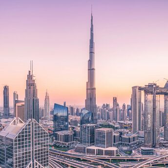 Dubai skyline with Burj Khalifa at sunset