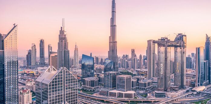 Dubai skyline with Burj Khalifa at sunset