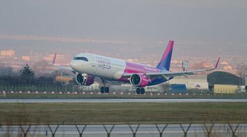Wizz Air aircraft landing at an airport