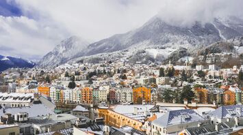 Snow-covered Innsbruck beneath the Austrian Alps